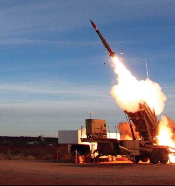 a missile launching from an Advanced Missile System Launcher using hydraulic system solutions